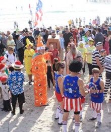 People in costumes at Dolphin dip