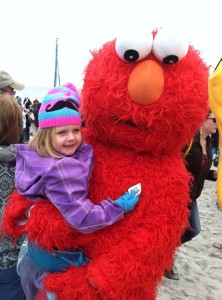 Elmo with a little girl